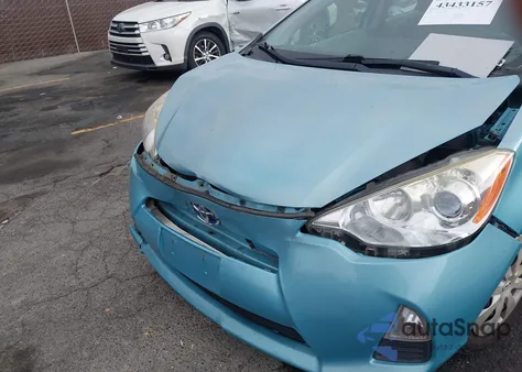 2014 Toyota Prius C Two z USA, uszkodzony, nr VIN JTDKDTB37E1074085